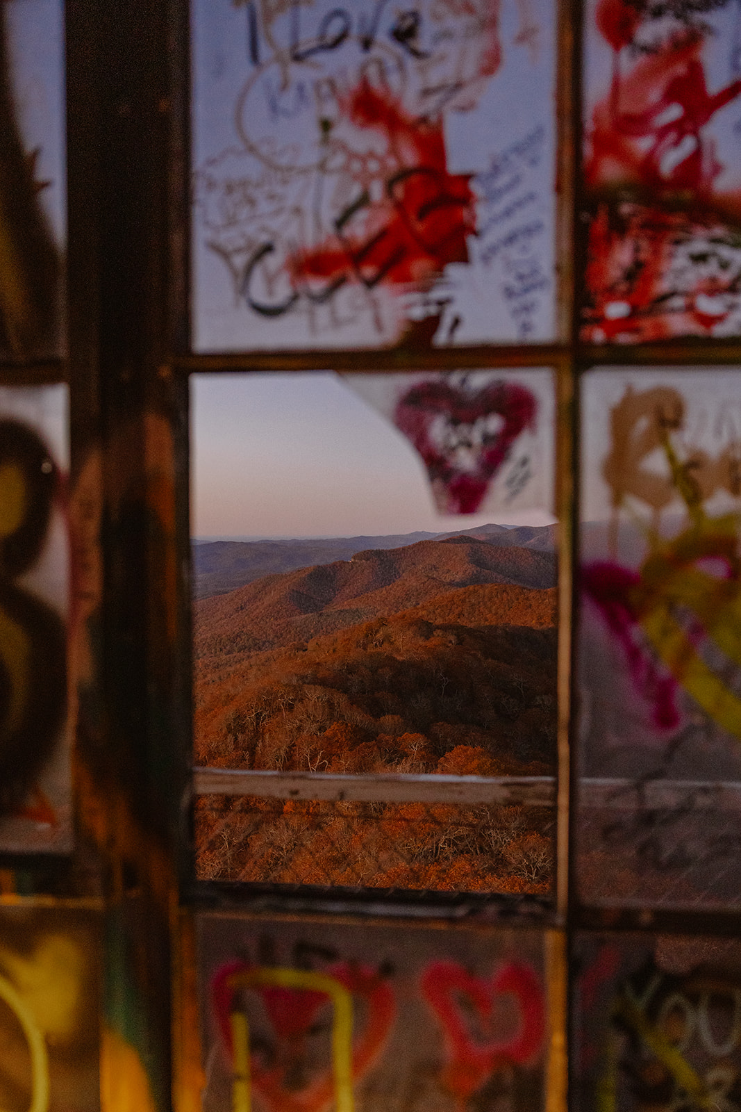 view of the Blue ridge mountains through the fire tower window