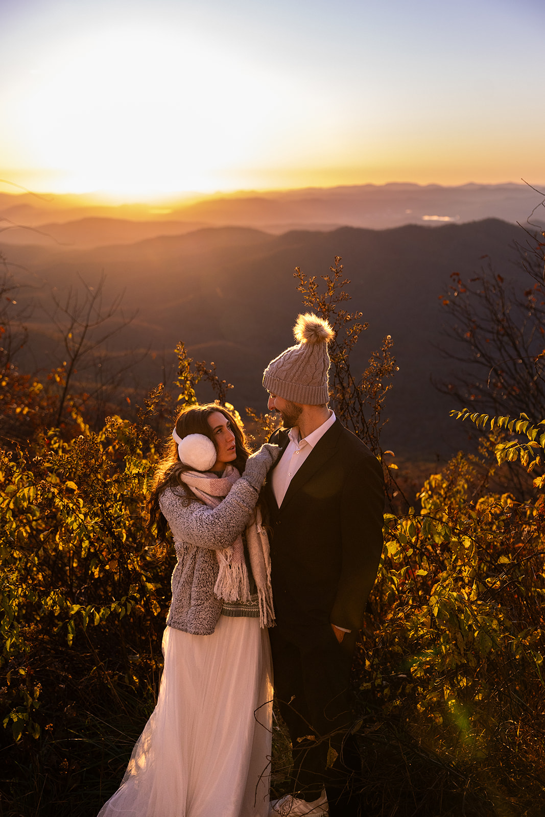 couple shares an intimate moment on the blue ridge parkway during their Asheville elopement