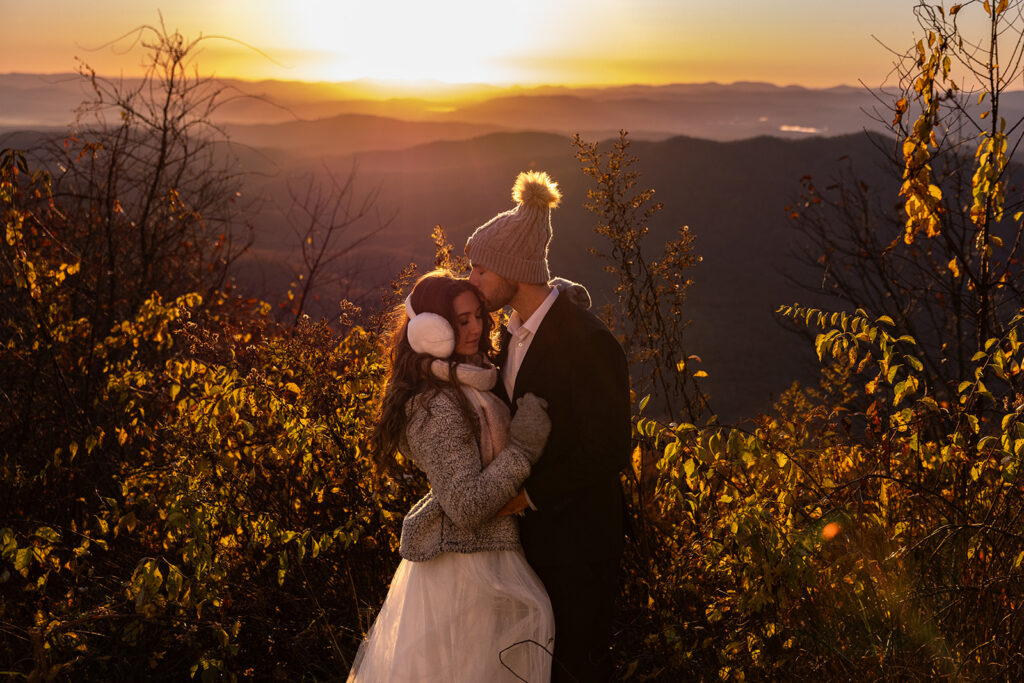 bride and groom share an intimate moment during a sunset on the blue ridge parkway