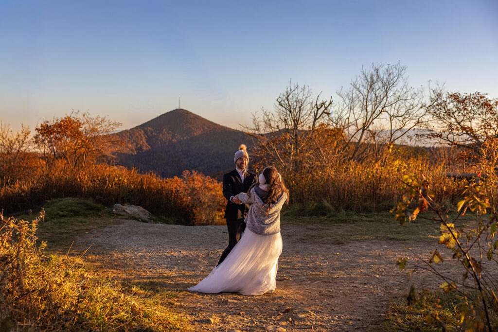bride and groom dance during their adventure elopement on the Blue Ridge parkway