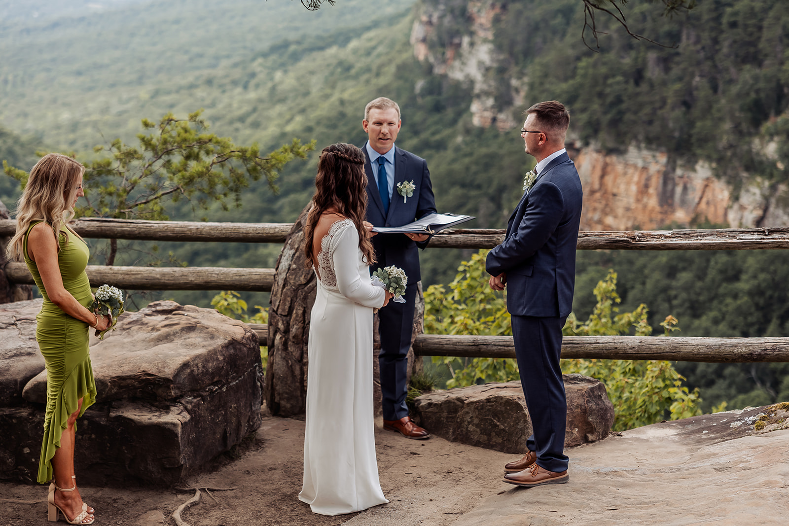 bride and groom during their elopement ceremony as their elopement timeline works it way through