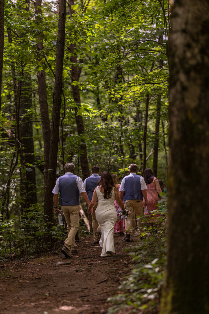 guests walk towards the elopement ceremony
