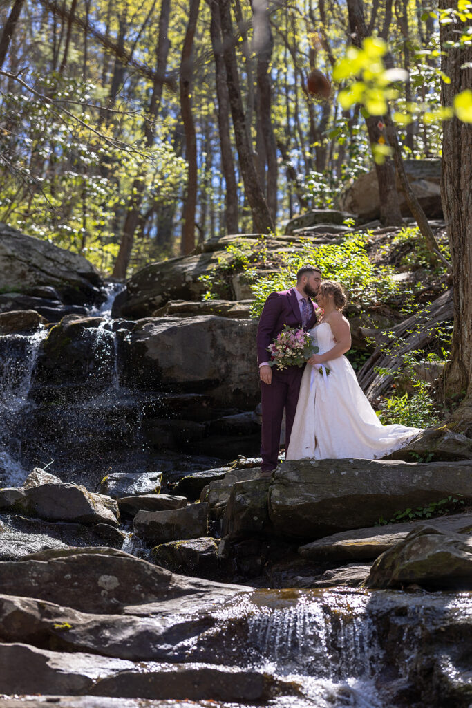 bride and groom share an intimate moment during their mountain elopement 