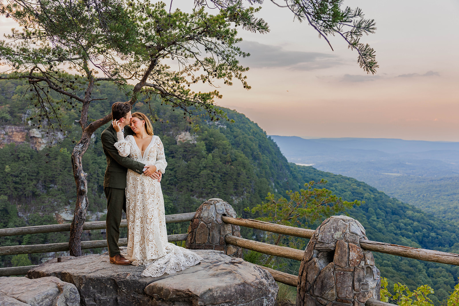 stunning couple share a moment of love together during their cloudland canyon elopement day in Georgia!