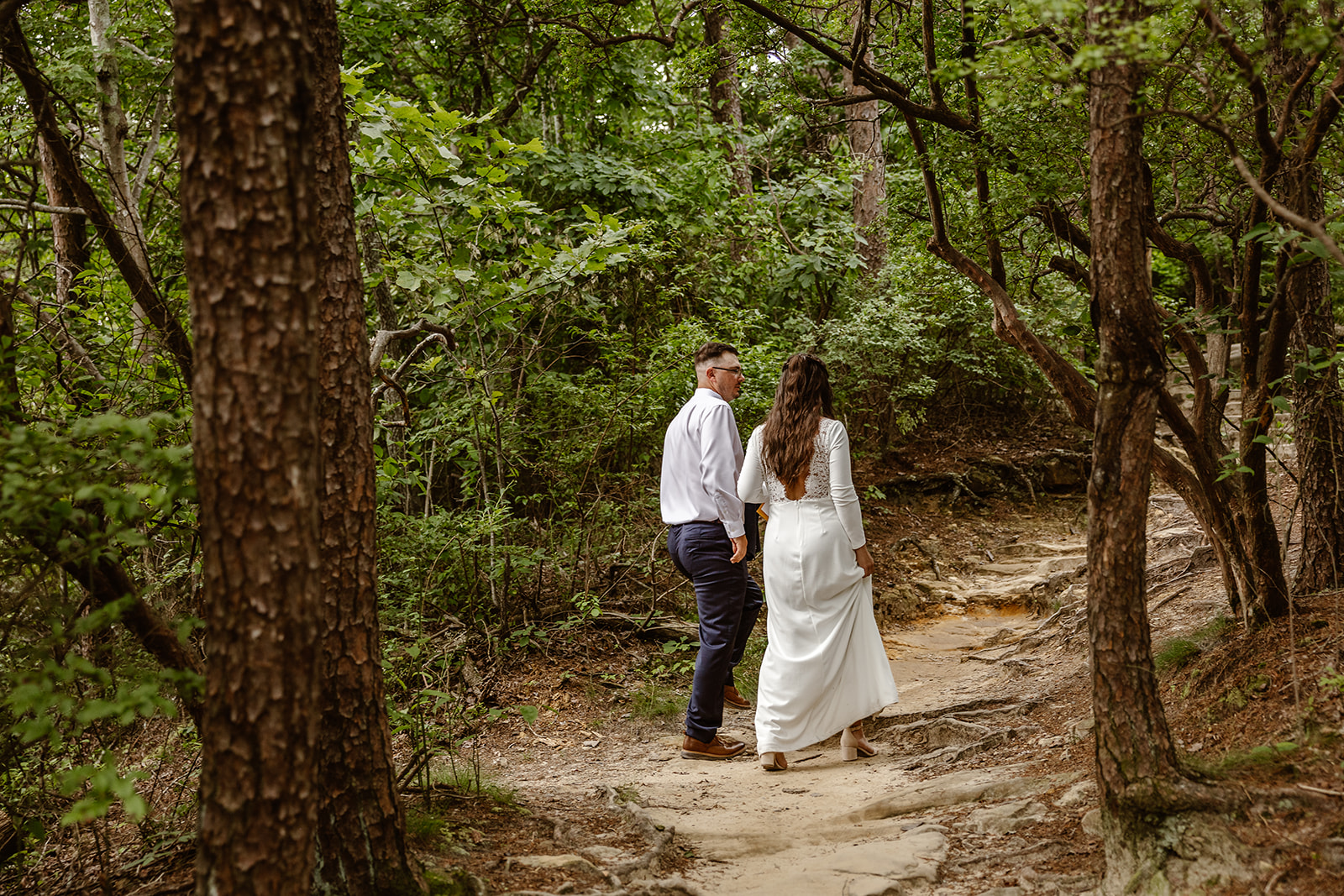 bride and groom walk and talk together after their Georgia elopement day