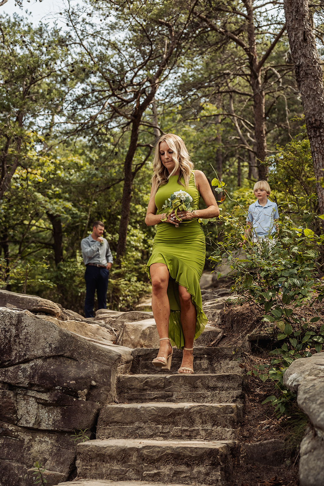 wedding guests and bridal party enter the beautiful cloudland canyon elopement ceremony