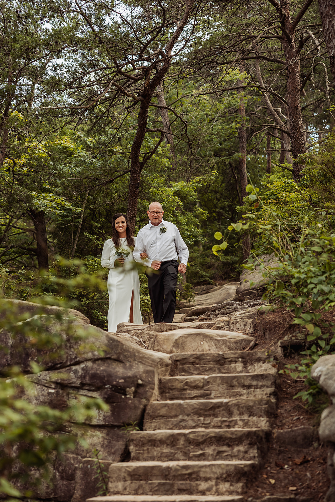 bride enters her stunning elopement day in the mountains