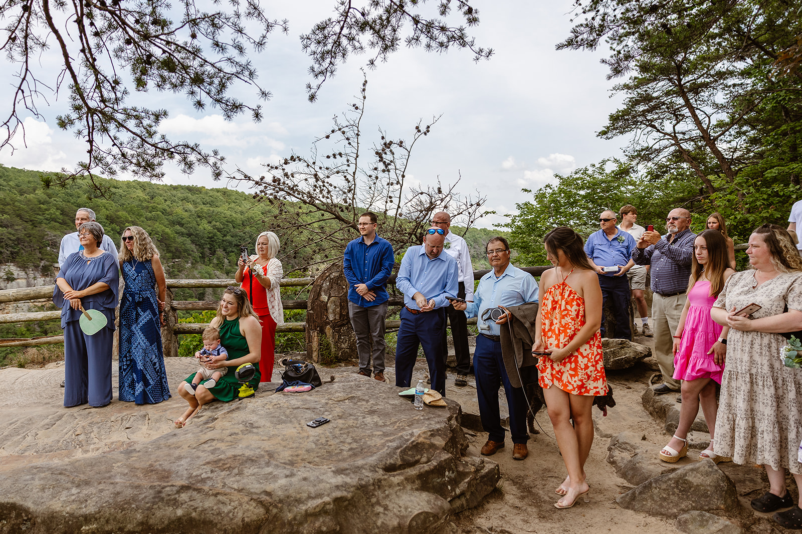 wedding guests look as the elopement takes place