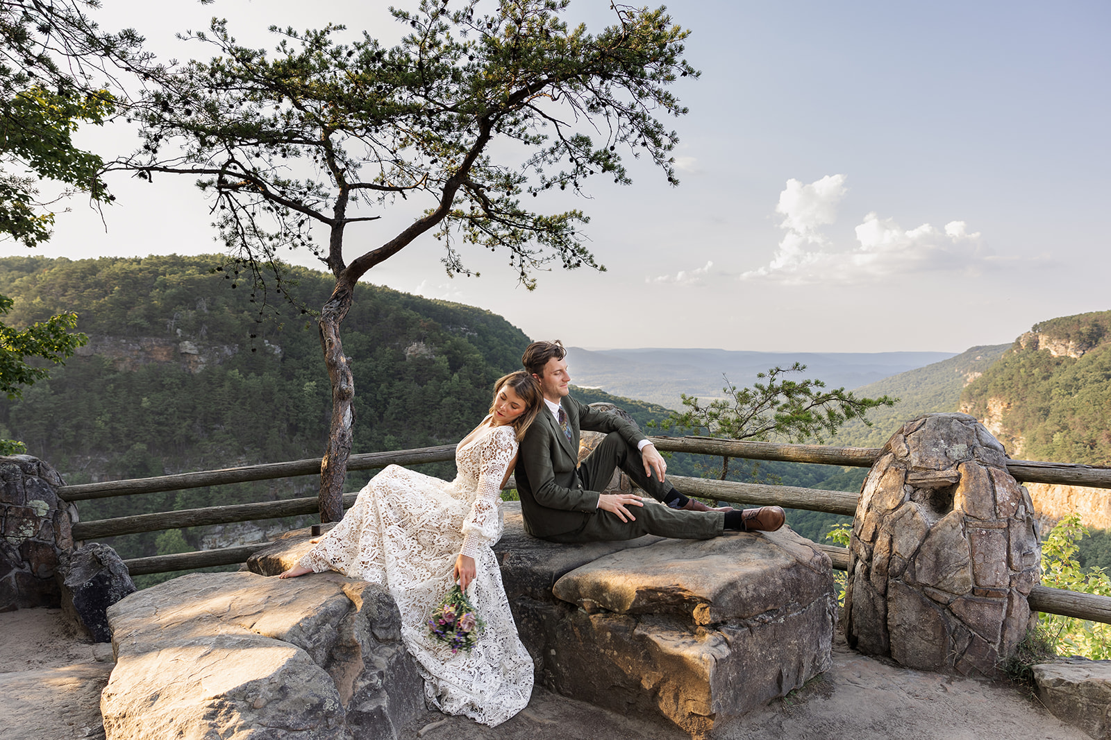 stunning couple share a moment of love together during their cloudland canyon elopement day in Georgia!