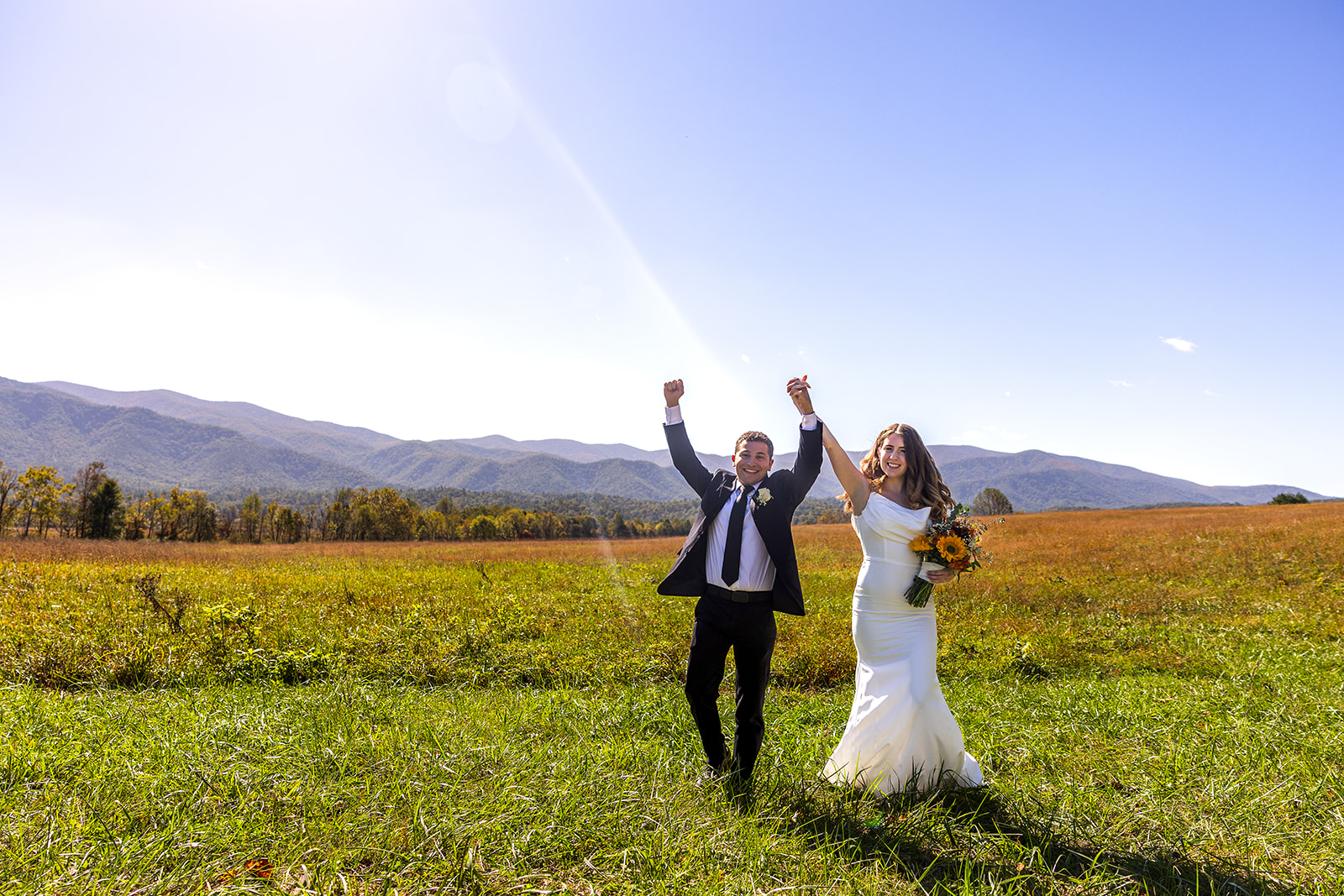 couple celebrate after their cades cove elopement
